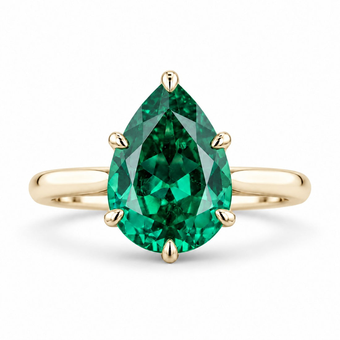The Lotus Lace — Pear Emerald Ring (Petal Setting) in 14K yellow gold, front view