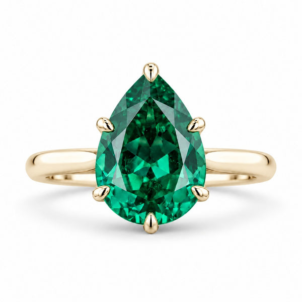 The Lotus Lace — Pear Emerald Ring (Petal Setting)