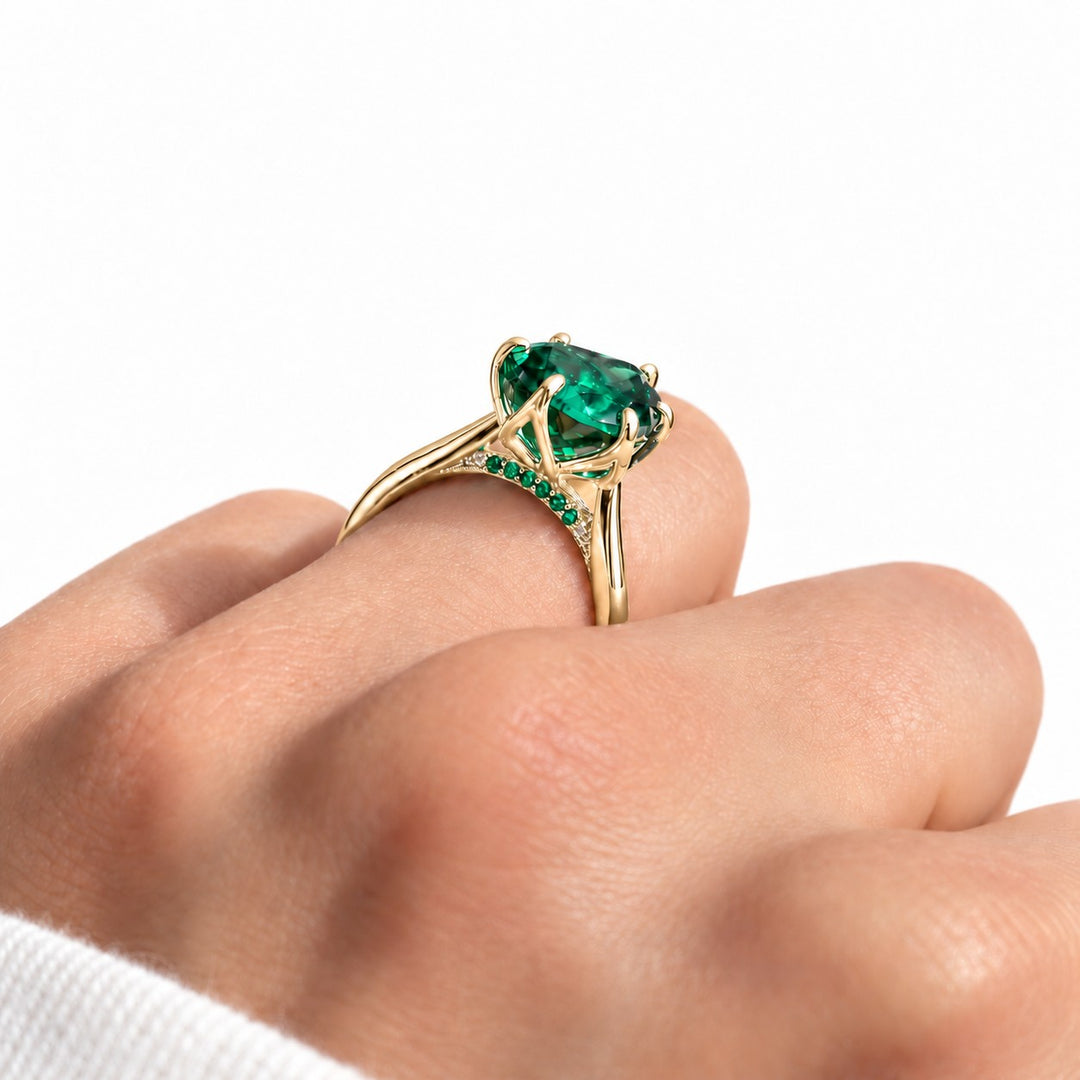 The Lotus Lace — Pear Emerald Ring (Petal Setting) in 14K yellow gold, wearing profile