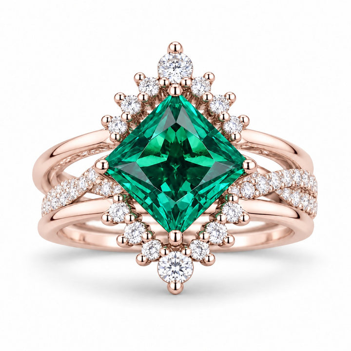 The Verdant Crown — Diamond Halo Emerald Ring (Twist Band) in 14K rose gold, front view