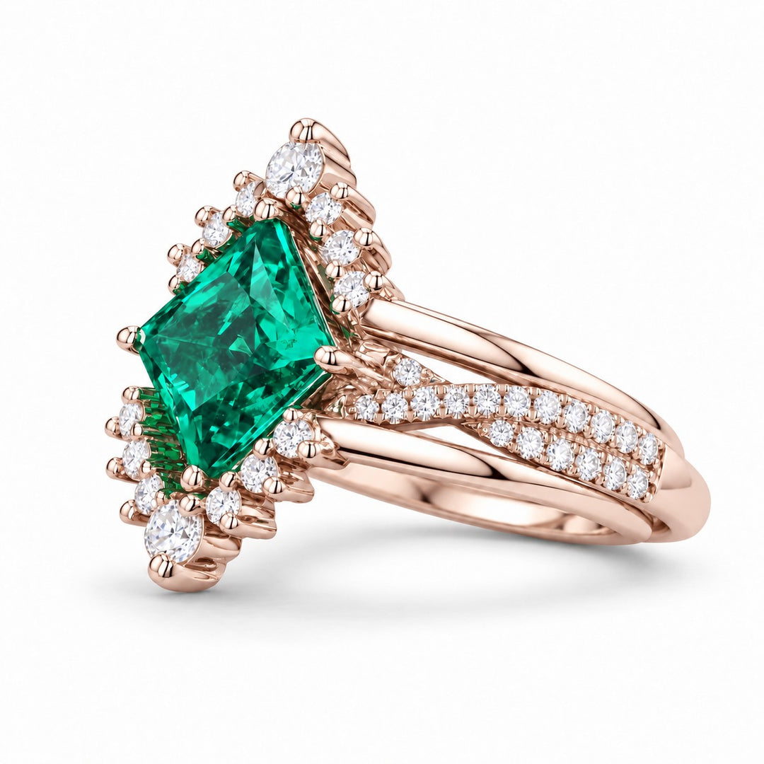 The Verdant Crown — Diamond Halo Emerald Ring (Twist Band) in 14K rose gold, three-quarter view