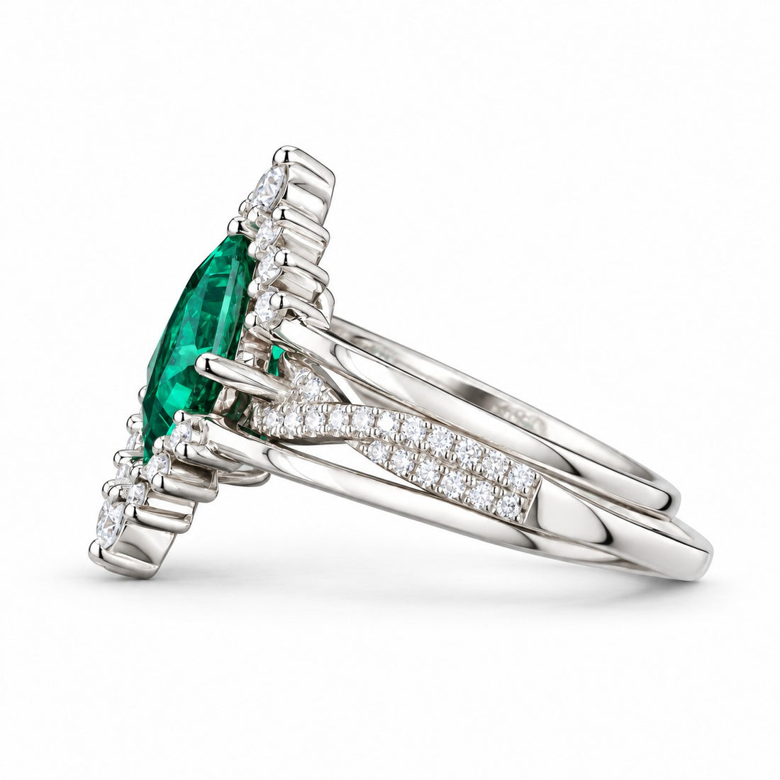 The Verdant Crown — Diamond Halo Emerald Ring (Twist Band) in 14K white gold, side view