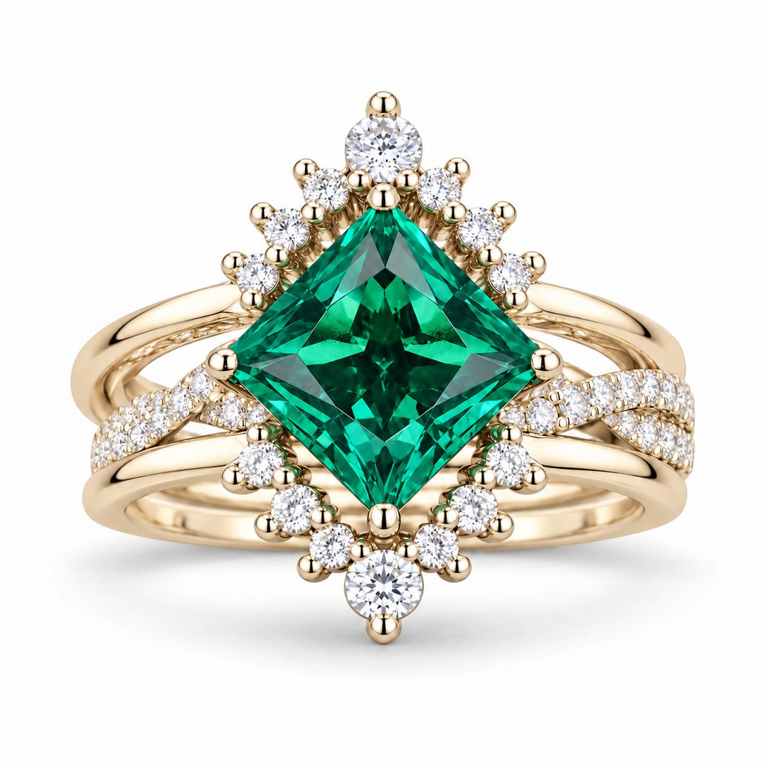 The Verdant Crown — Diamond Halo Emerald Ring (Twist Band) in 14K yellow gold, front view