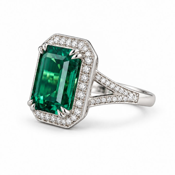 The Interlace — Split Pavé Emerald Halo in 14K white gold, three-quarter view