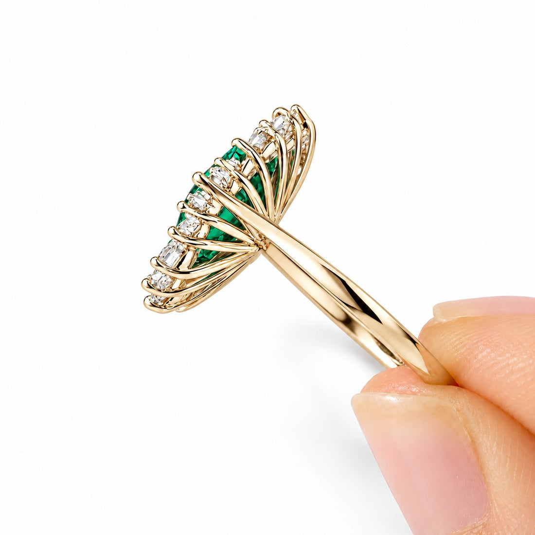 The Helios — Diamond Sunburst Emerald Ring in 14K yellow gold, side view
