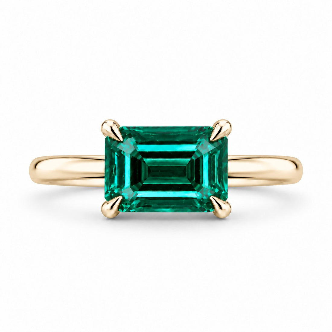 The Linea — Emerald Ring in 14K yellow gold, front view