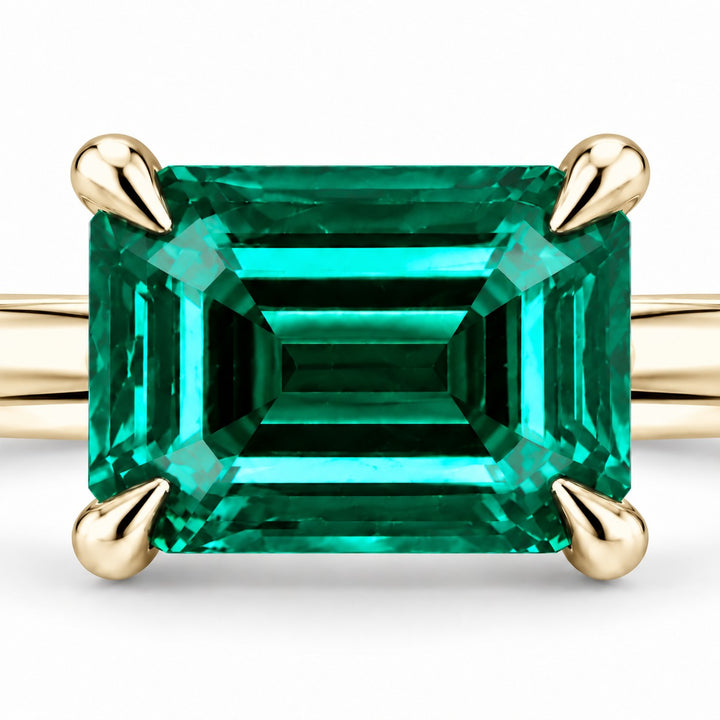 The Linea — Emerald Ring in 14K yellow gold, stone and setting detail