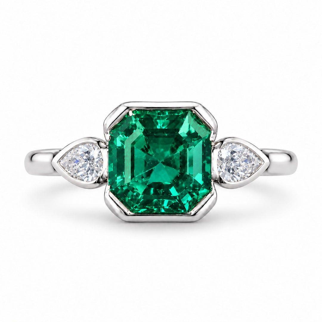 The Embrace — Emerald & Diamond Ring in 14K white gold, front view