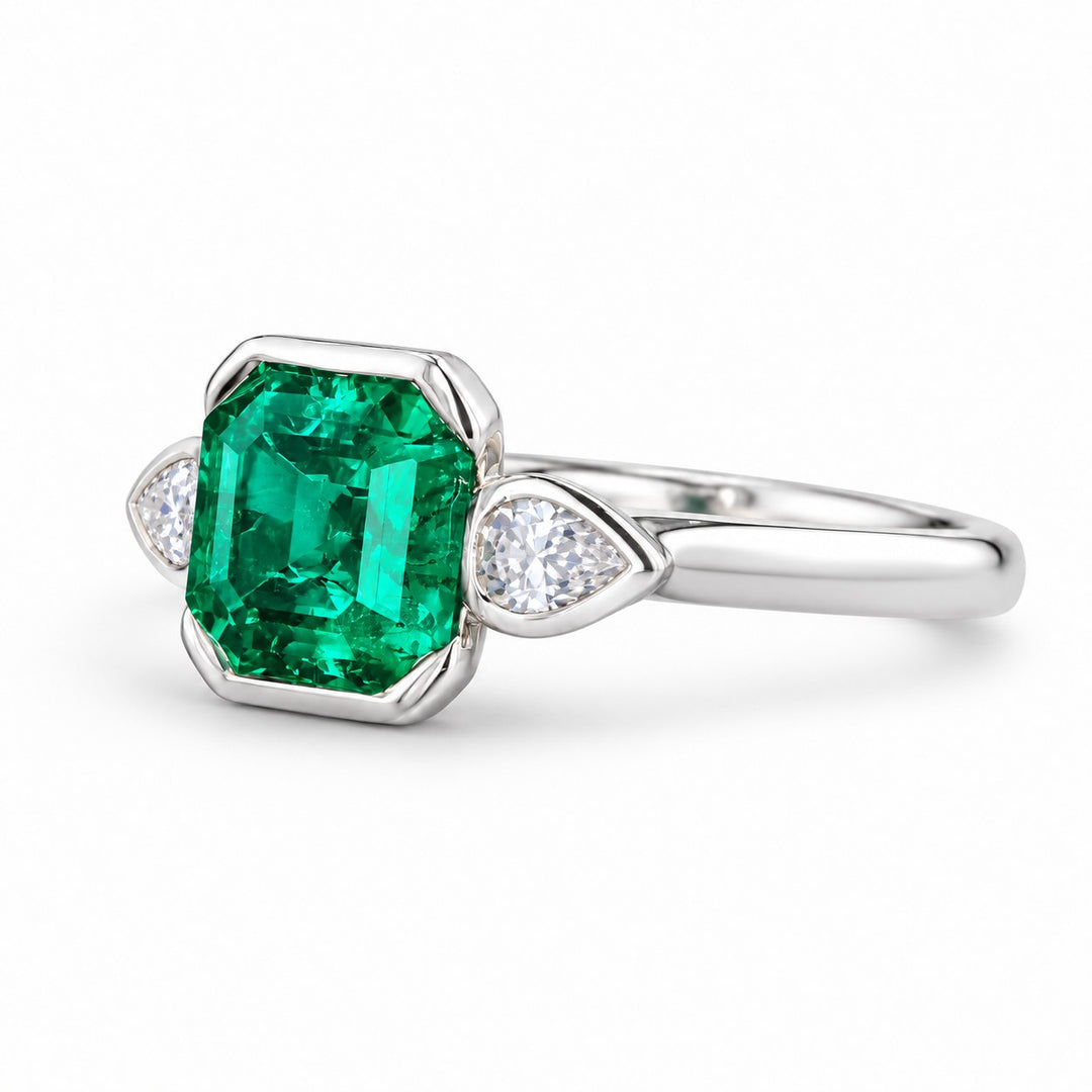 The Embrace — Emerald & Diamond Ring in 14K white gold, three-quarter view