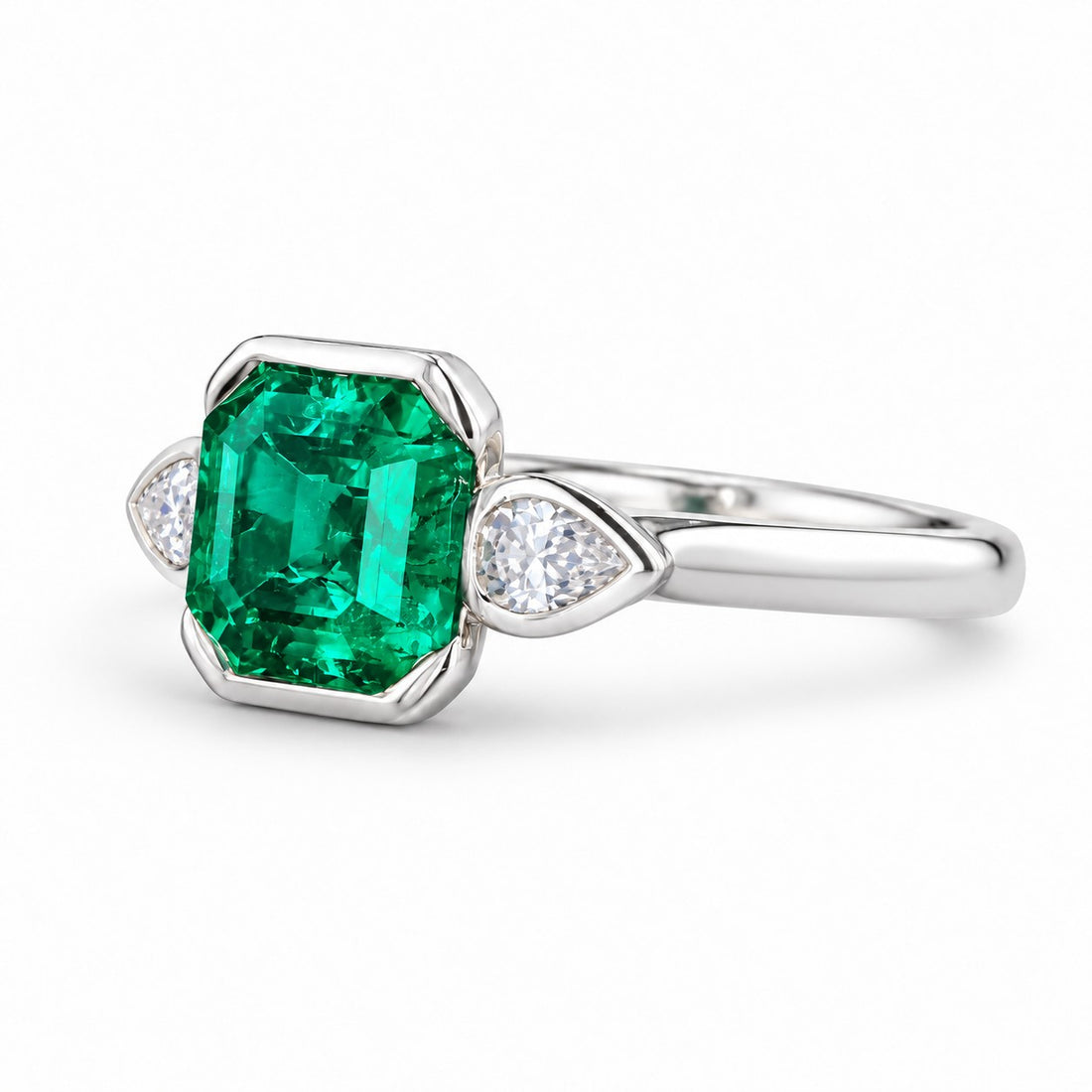The Embrace — Emerald & Diamond Ring in 14K white gold, three-quarter view