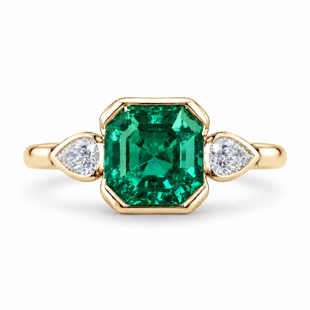 The Embrace — Emerald & Diamond Ring in 14K yellow gold, front view