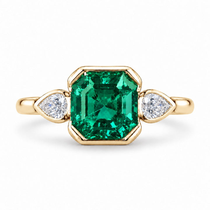 The Embrace — Emerald & Diamond Ring in 14K yellow gold, front view