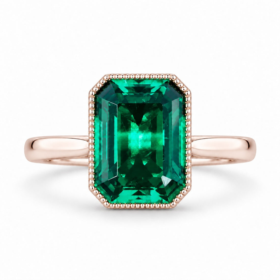 The Paragon — Milgrain Bezel Emerald Ring in 14K rose gold, front view