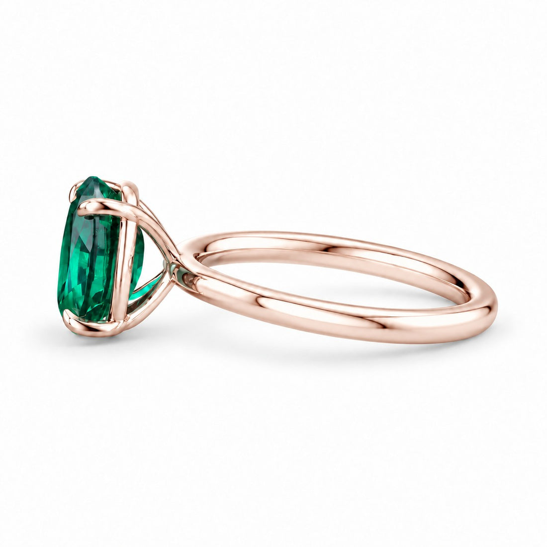 The Essence — Oval Emerald Ring in 14K rose gold, side view