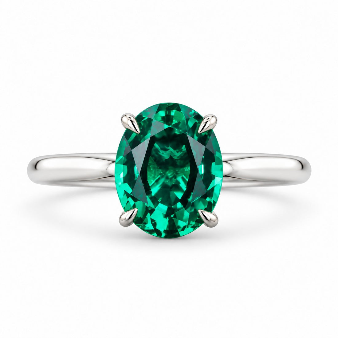 The Essence — Oval Emerald Ring in 14K white gold, front view