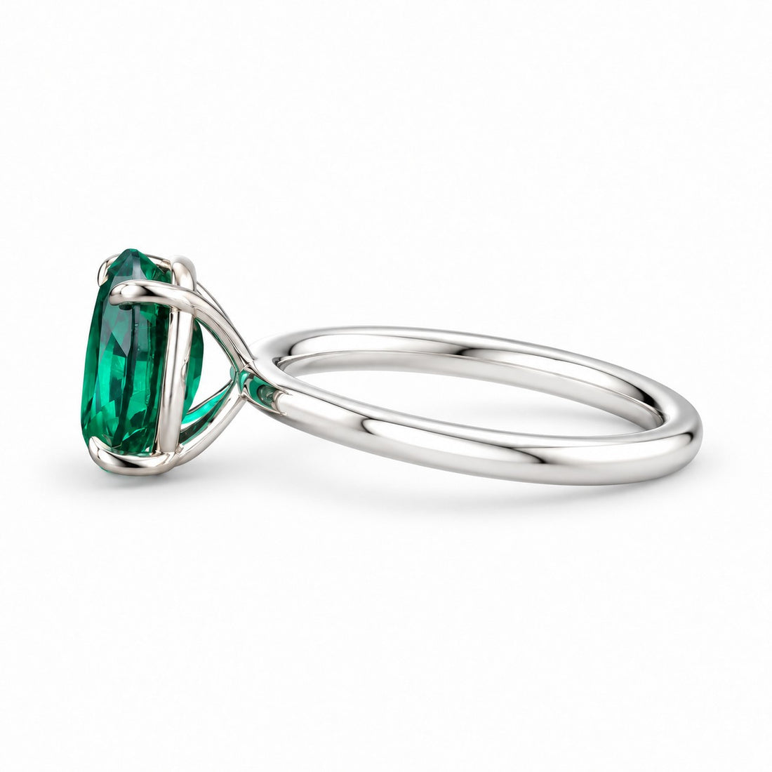 The Essence — Oval Emerald Ring in 14K white gold, side view