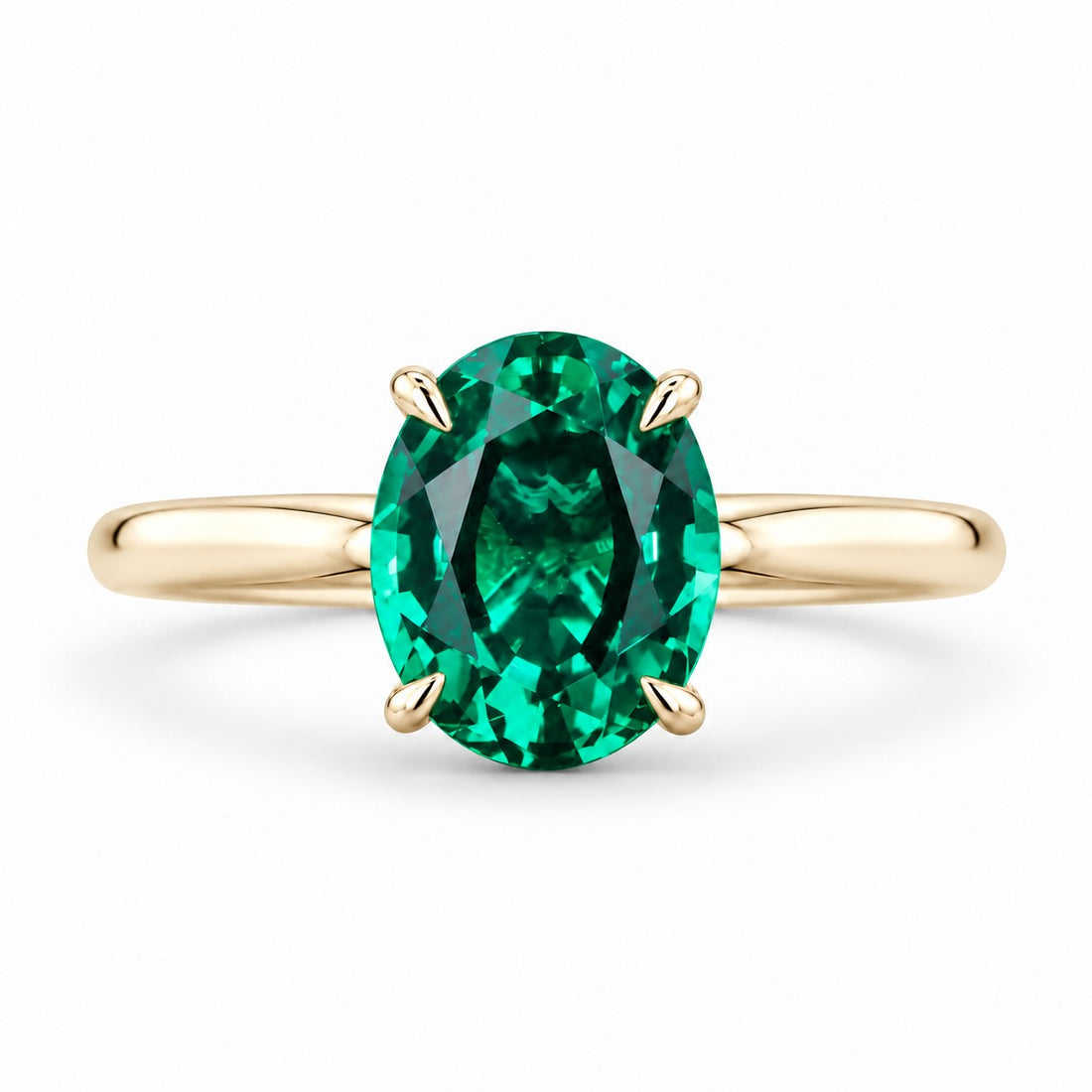 The Essence — Oval Emerald Ring in 14K yellow gold, front view
