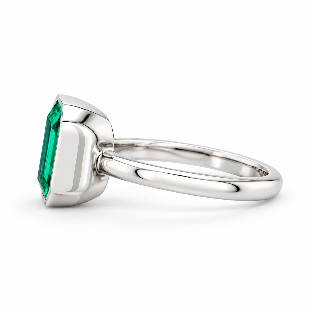 The Axis — East–West Emerald Ring in 14K white gold, side view
