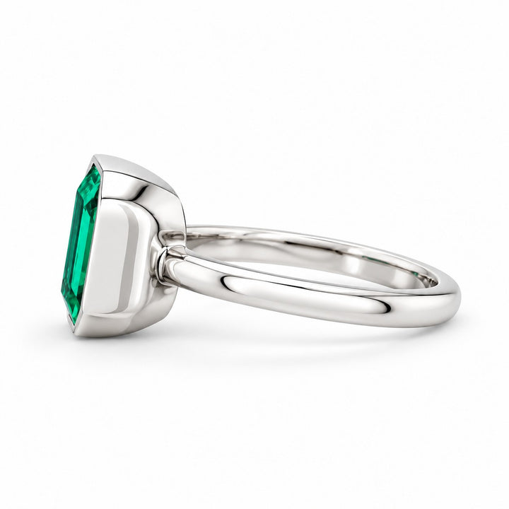 The Axis — East–West Emerald Ring in 14K white gold, side view