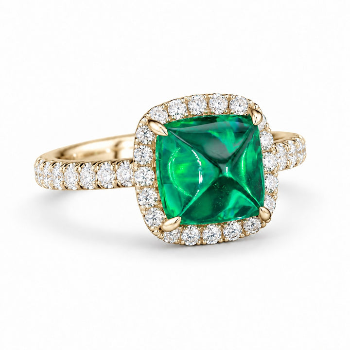 The Prism — Diamond Halo Emerald Ring in 14K yellow gold, three-quarter view
