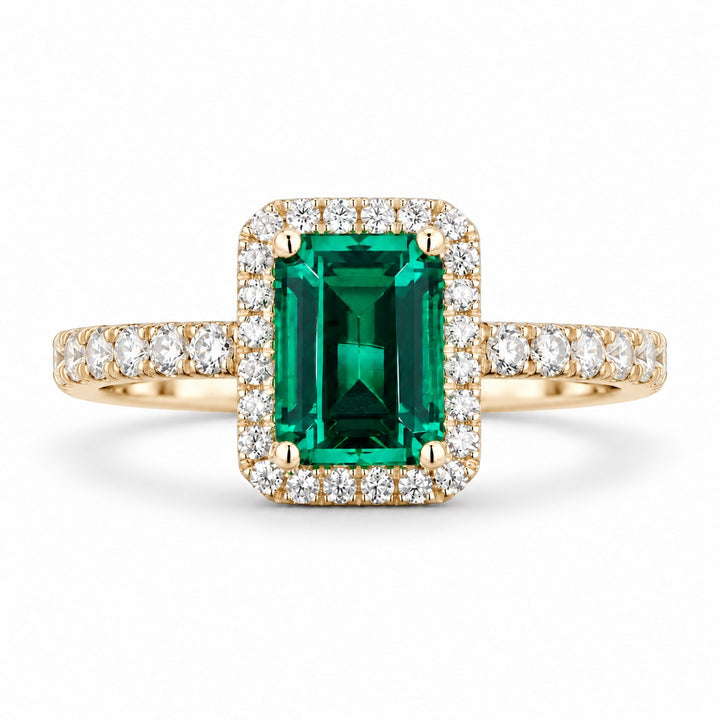 The Aurelia Halo — Diamond Halo/Band Emerald Ring in 14K yellow gold, front view