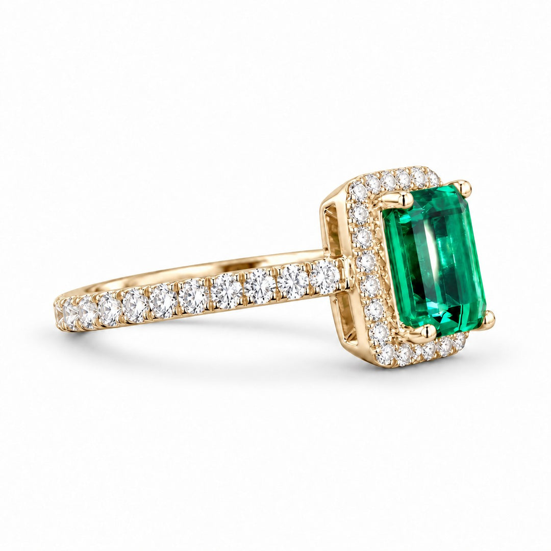 The Aurelia Halo — Diamond Halo/Band Emerald Ring in 14K yellow gold, side view