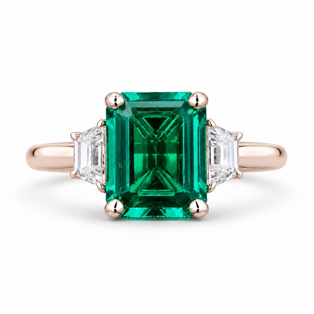 The Meridian — Emerald Three-Stone Ring in 14K rose gold, front view