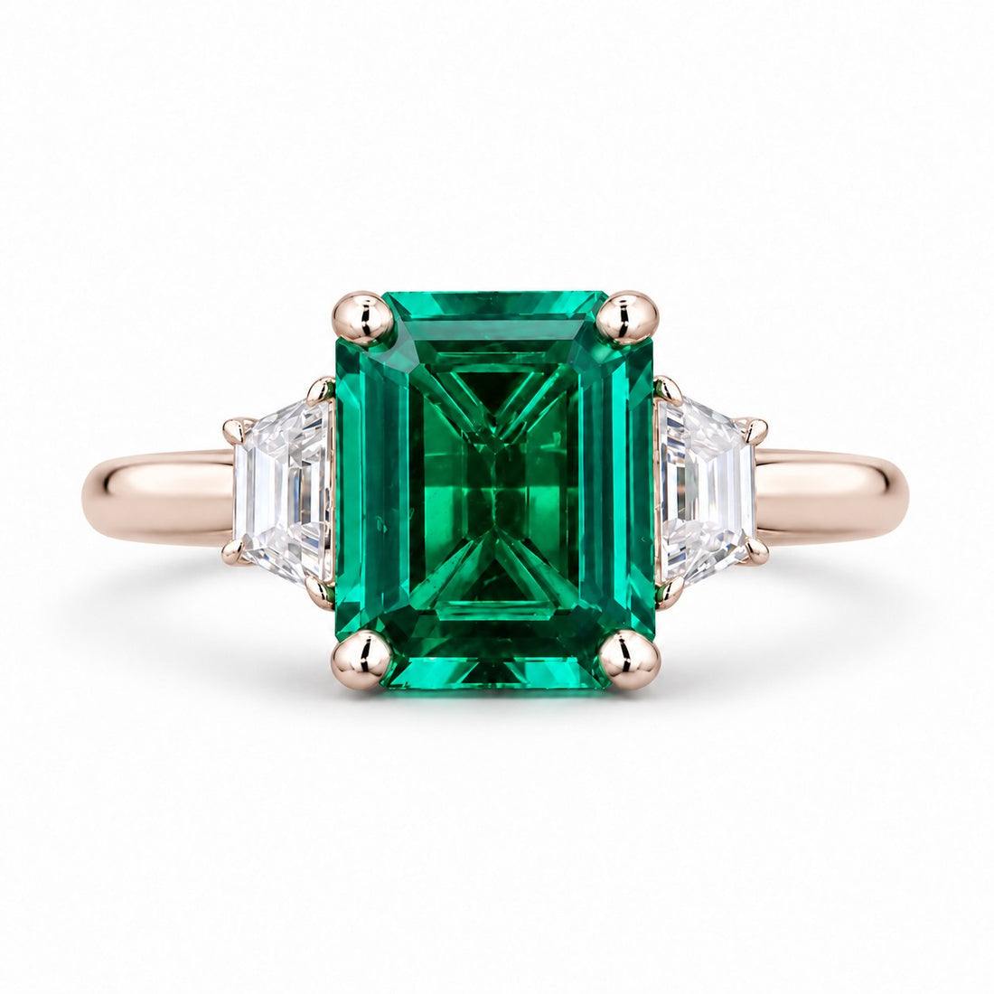 The Meridian — Emerald Three-Stone Ring in 14K rose gold, front view