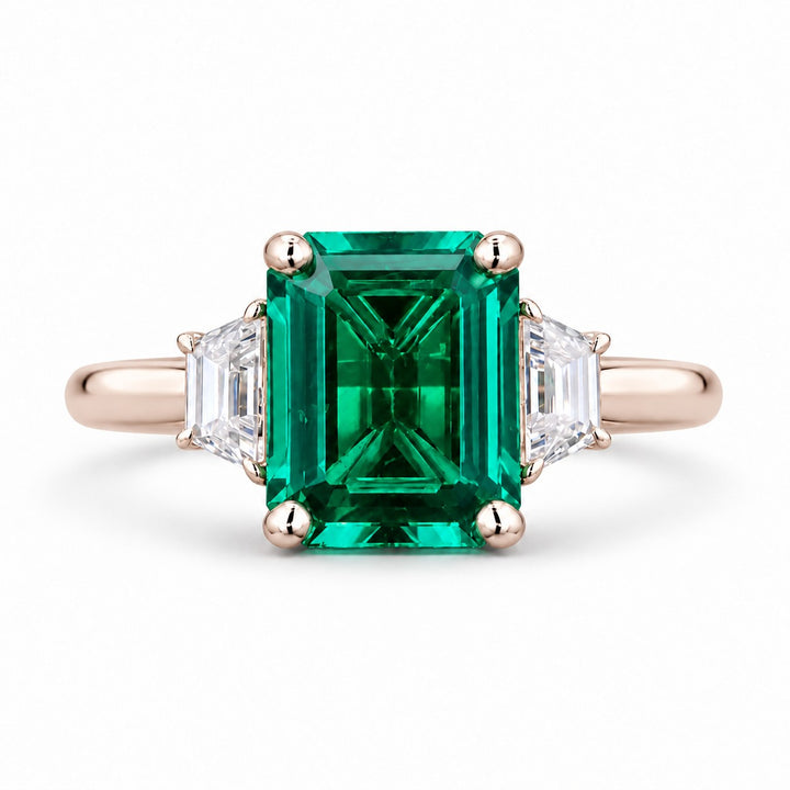 The Meridian — Emerald Three-Stone Ring in 14K rose gold, front view