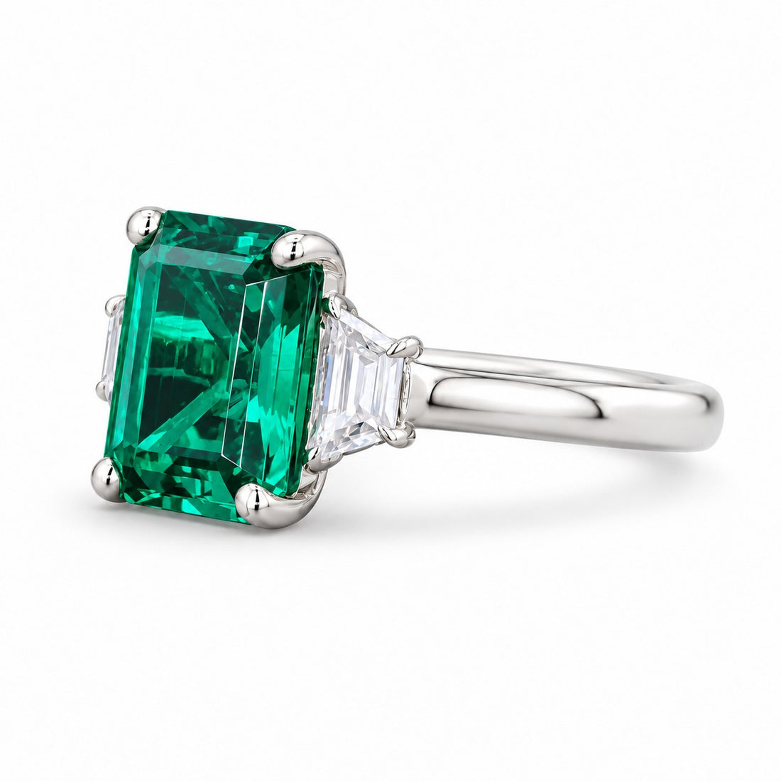 The Meridian — Emerald Three-Stone Ring in 14K white gold, side view