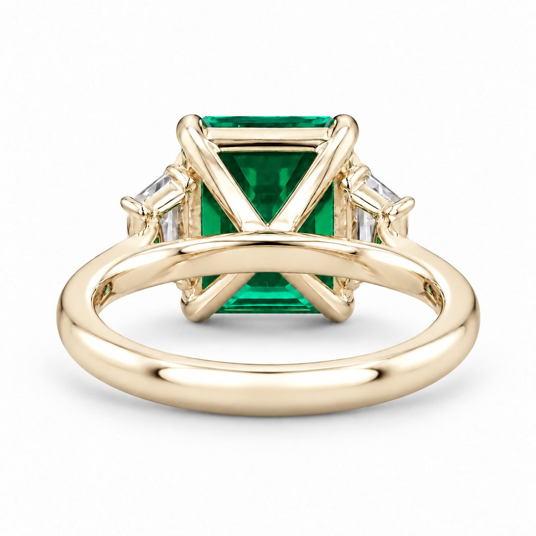 The Meridian — Emerald Three-Stone Ring in 14K yellow gold, back and setting