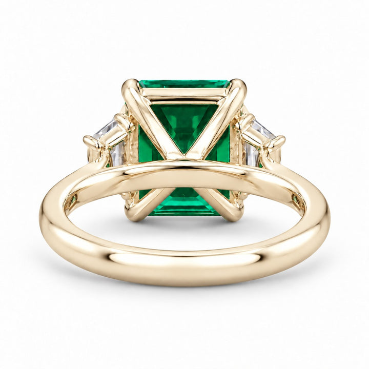 The Meridian — Emerald Three-Stone Ring in 14K yellow gold, back and setting