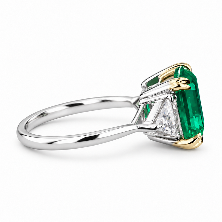 The Facet — Emerald Three-Stone Ring in 14K two-tone gold, side view