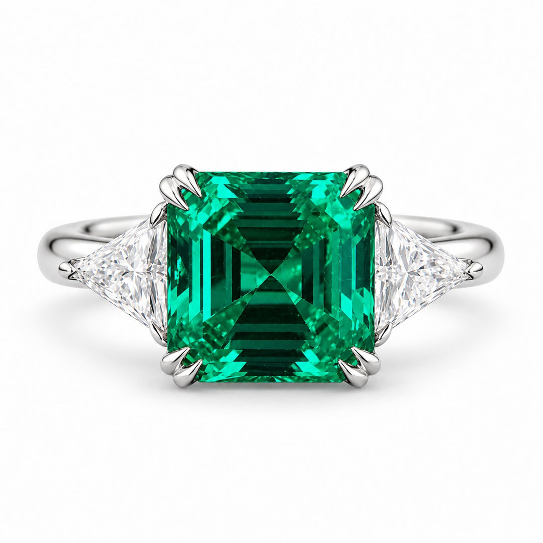 The Facet — Emerald Three-Stone Ring in 14K white gold, front view