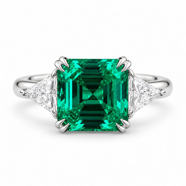 The Facet — Emerald Three-Stone Ring in 14K white gold, front view