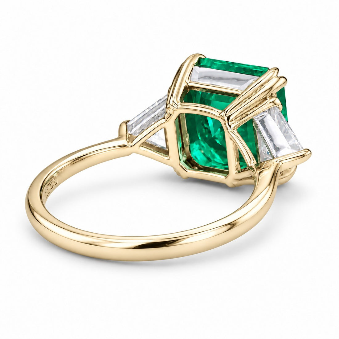 The Facet — Emerald Three-Stone Ring in 14K yellow gold, back and setting