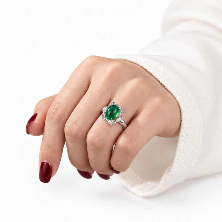 The Bloom — Cabochon Emerald Ring in 14K white gold, on the hand
