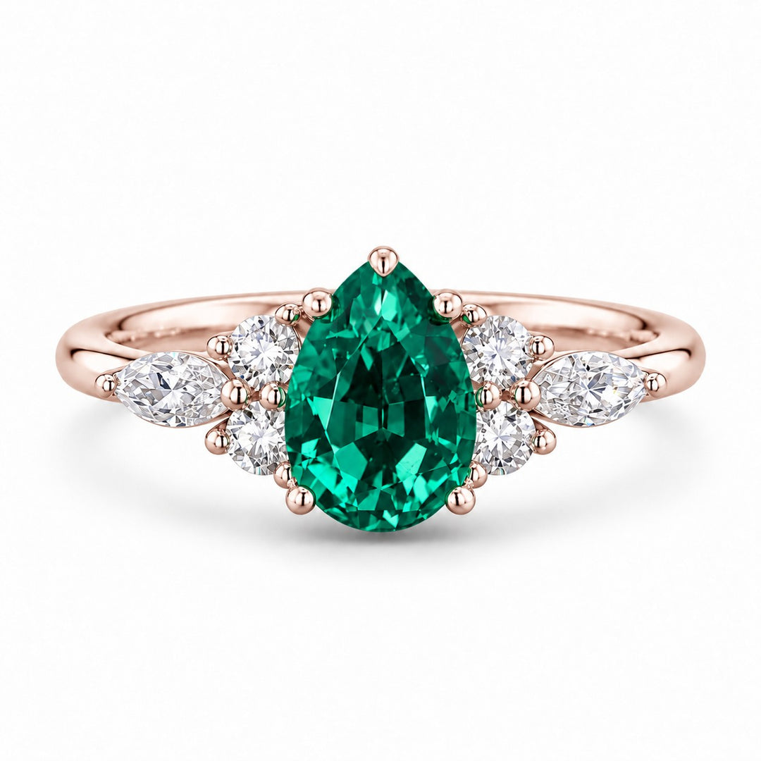 The Dew — Pear Emerald Ring in 14K rose gold, front view