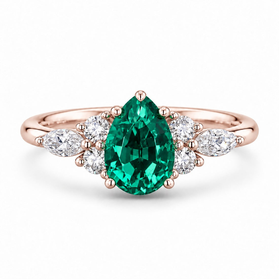 The Dew — Pear Emerald Ring in 14K rose gold, front view