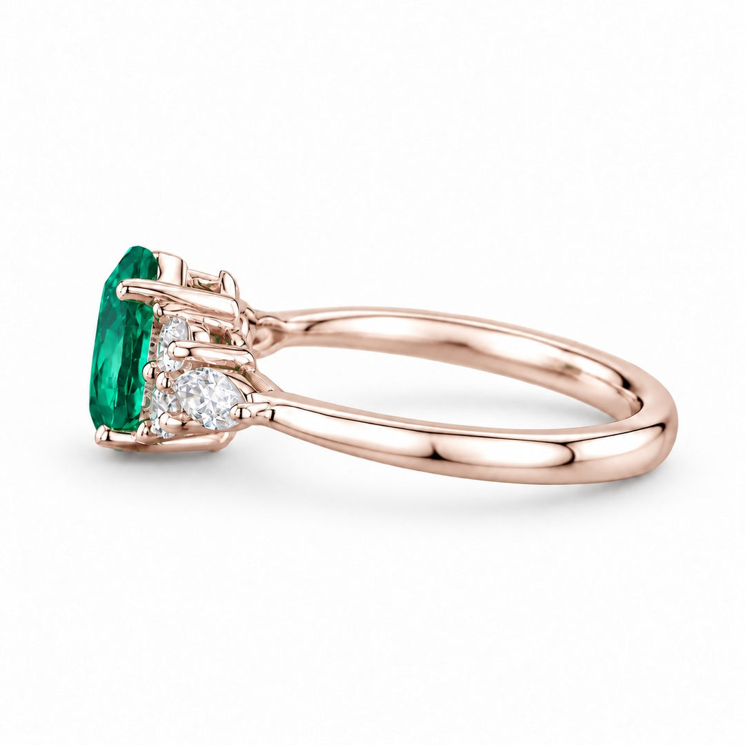 The Dew — Pear Emerald Ring in 14K rose gold, side view