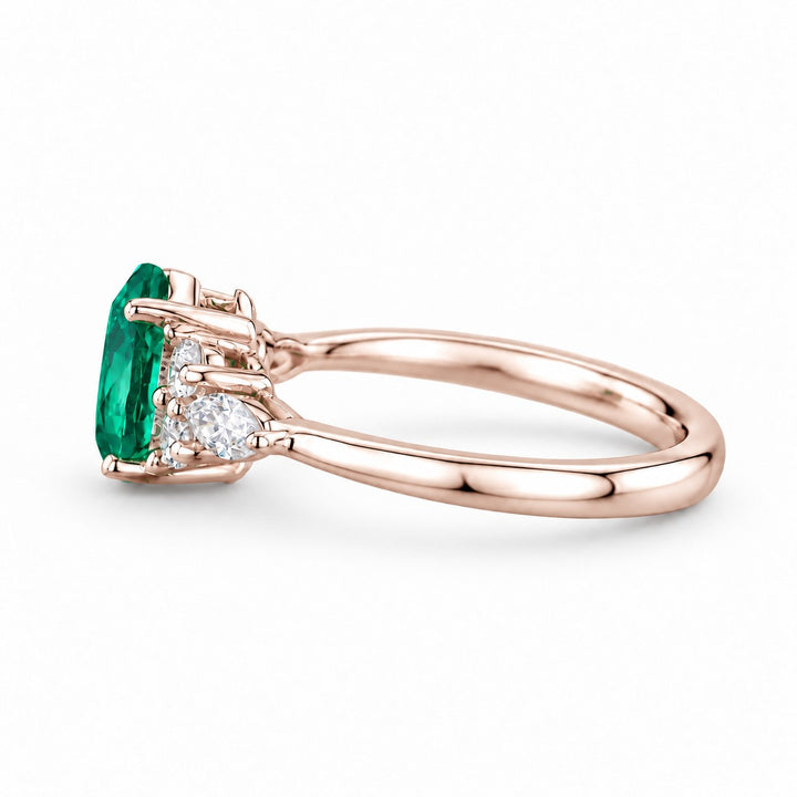 The Dew — Pear Emerald Ring in 14K rose gold, side view