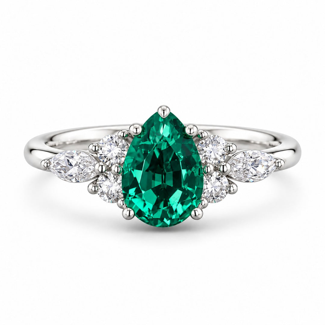 The Dew — Pear Emerald Ring in 14K white gold, front view