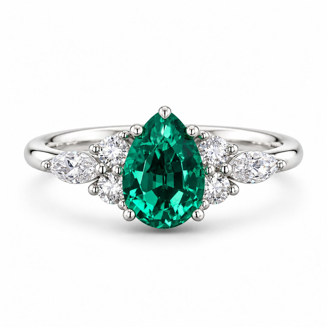 The Dew — Pear Emerald Ring in 14K white gold, front view