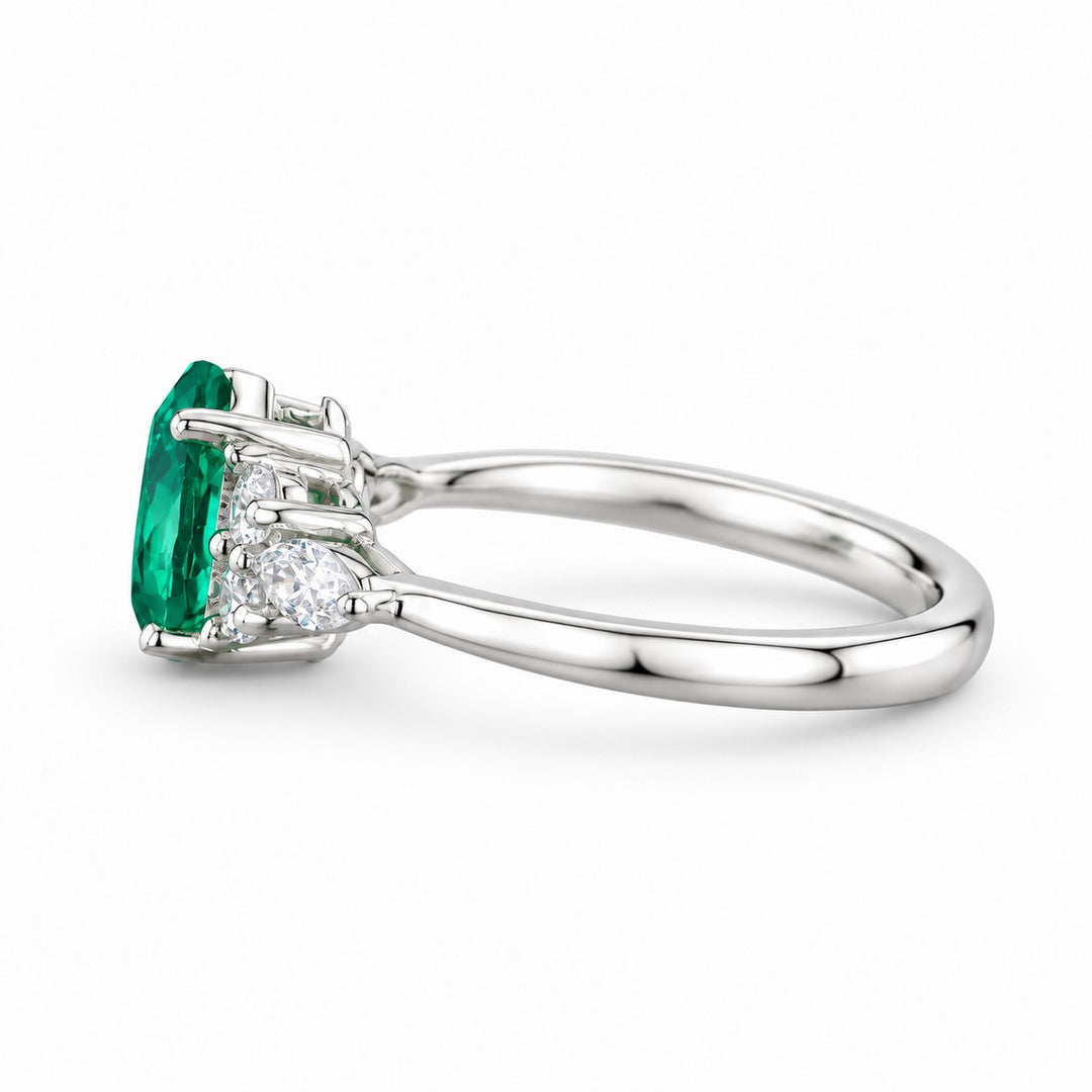The Dew — Pear Emerald Ring in 14K white gold, side view