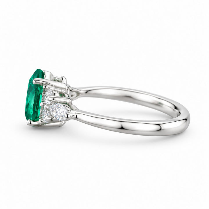 The Dew — Pear Emerald Ring in 14K white gold, side view