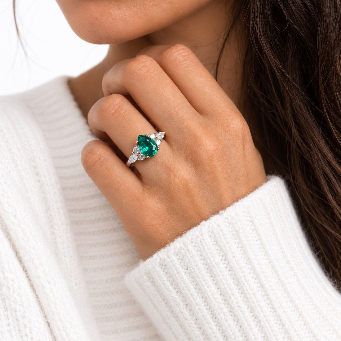 The Dew — Pear Emerald Ring in 14K white gold, on the hand