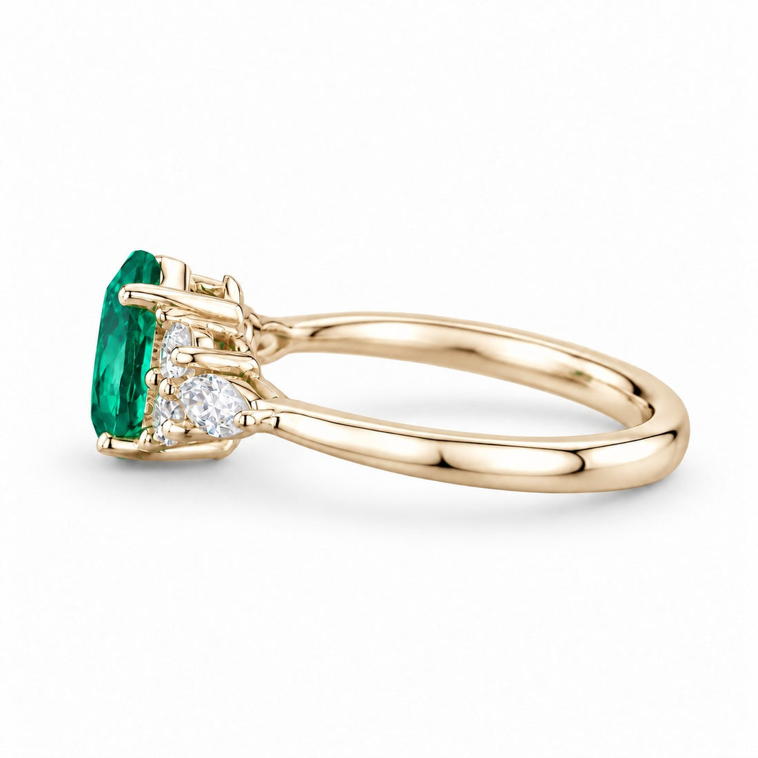 The Dew — Pear Emerald Ring in 14K yellow gold, side view