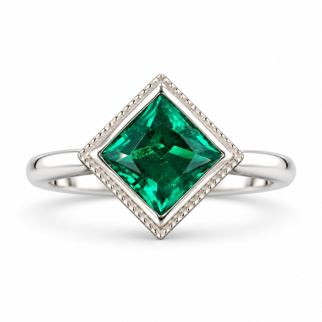 The Compass — Milgrain Bezel Emerald Ring in 14K white gold, front view