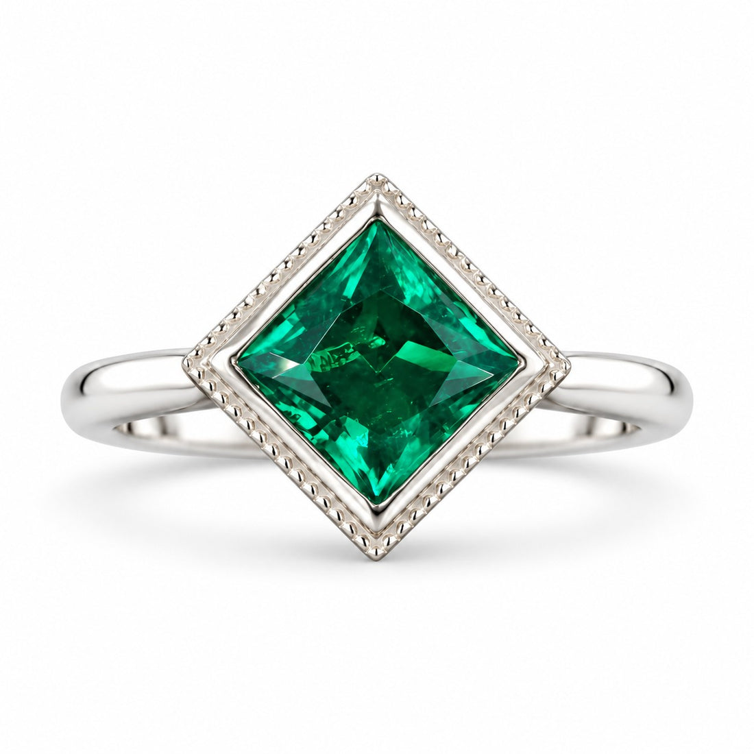 The Compass — Milgrain Bezel Emerald Ring in 14K white gold, front view