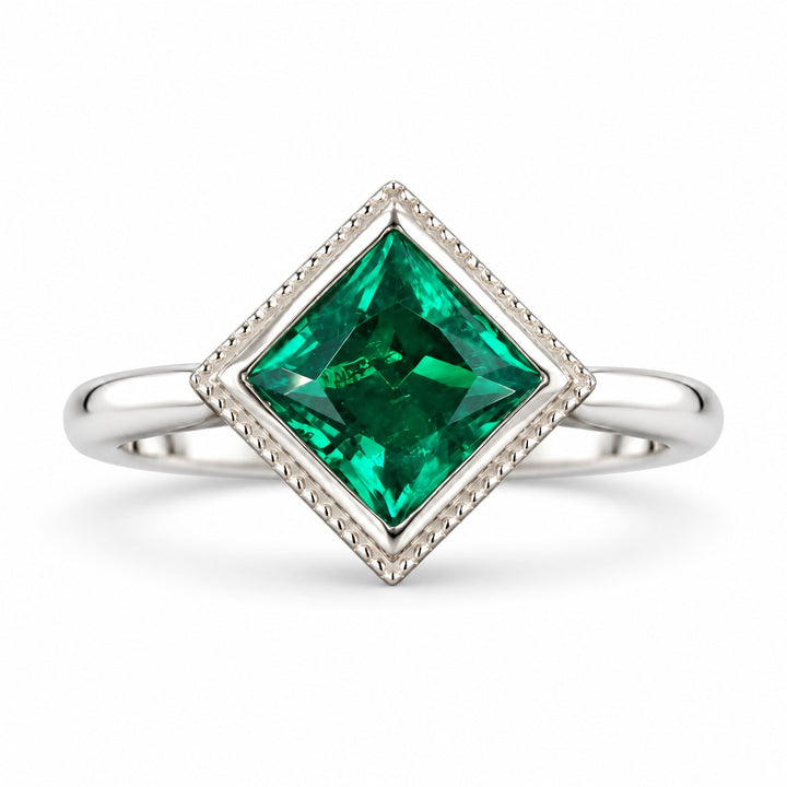The Compass — Milgrain Bezel Emerald Ring in 14K white gold, front view
